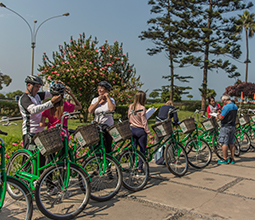 Tourists ready to ride a bicycle in Lima
